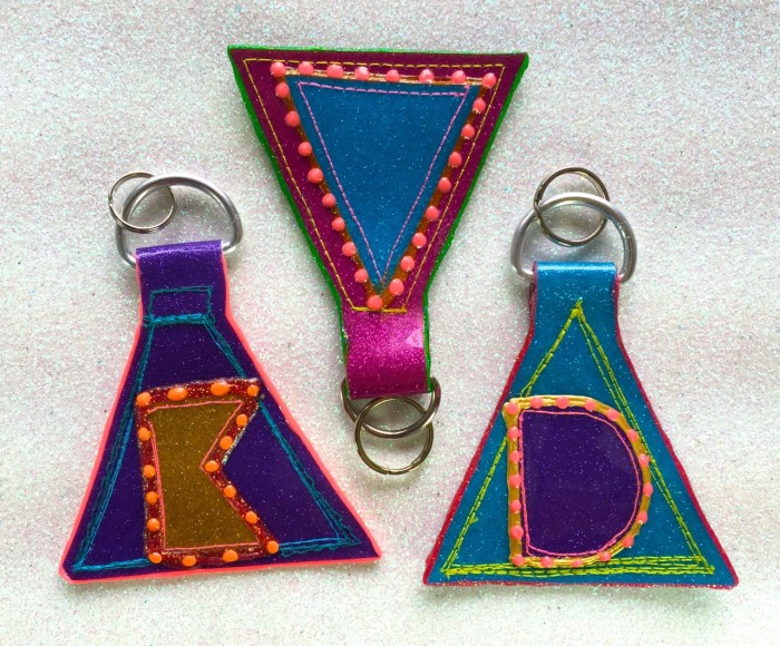 glitter vinyl keychains, made by Julianne